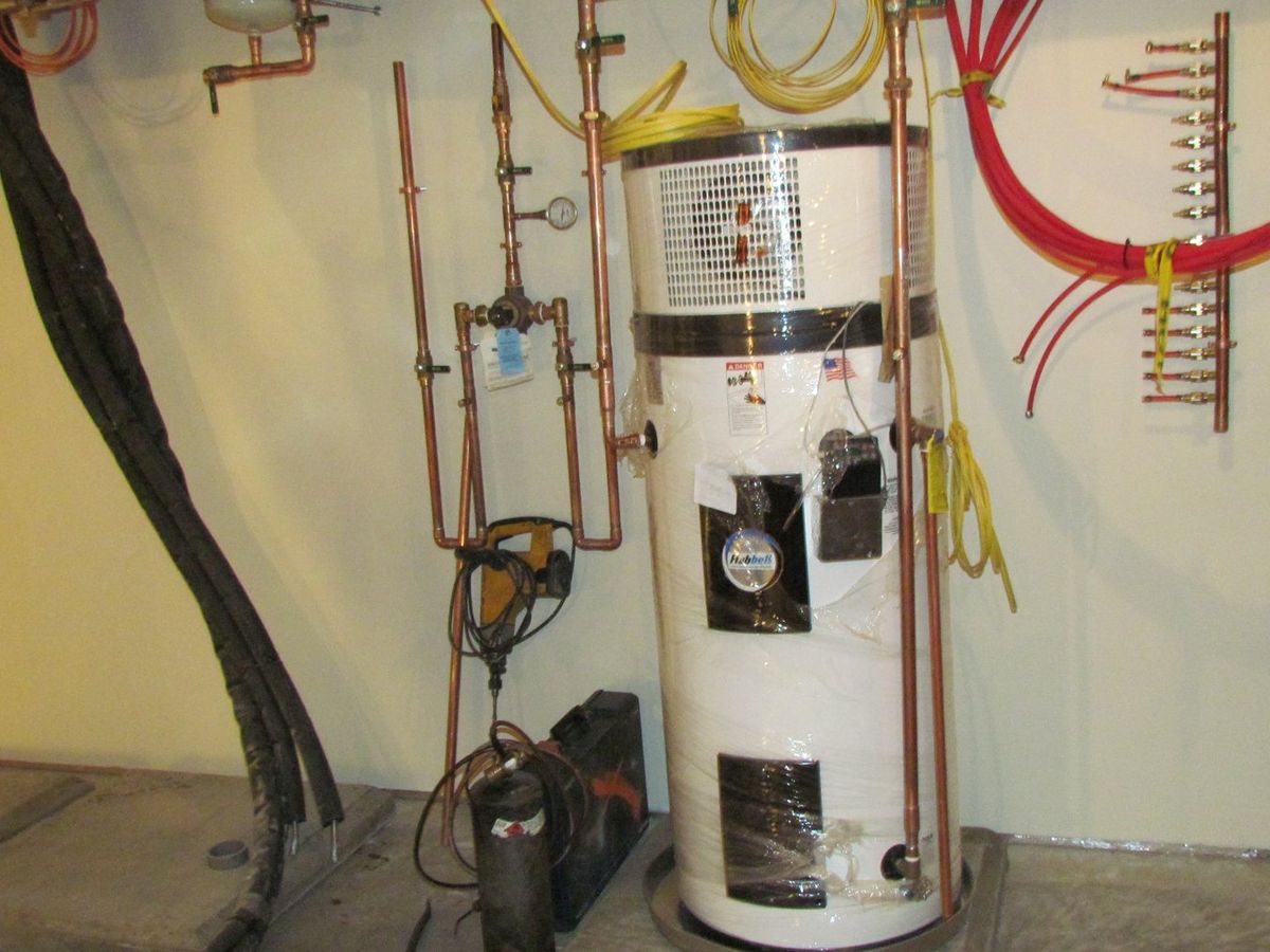 Water heater with copper supply lines in a basement