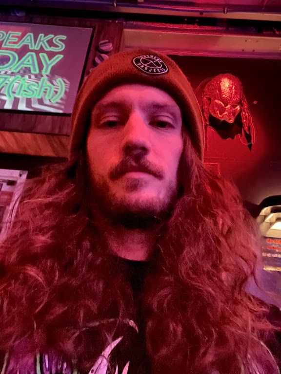 Long hair era, bar lighting.