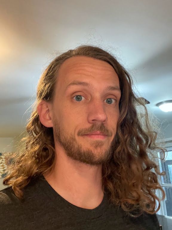 Russ with long curly hair